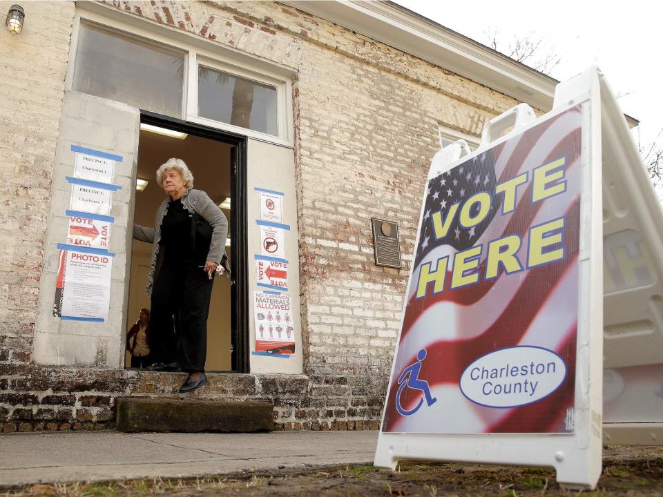 A voter leaves after voting in the U.S. Republican presidential primary at a polling station in Charleston, South Carolina.