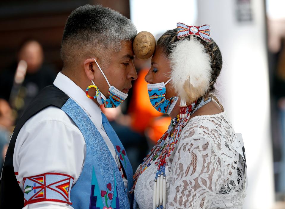 James and Jamie Yellowfish dance together during the Potato Dance World Championships at the First Americans Museum in Oklahoma City.