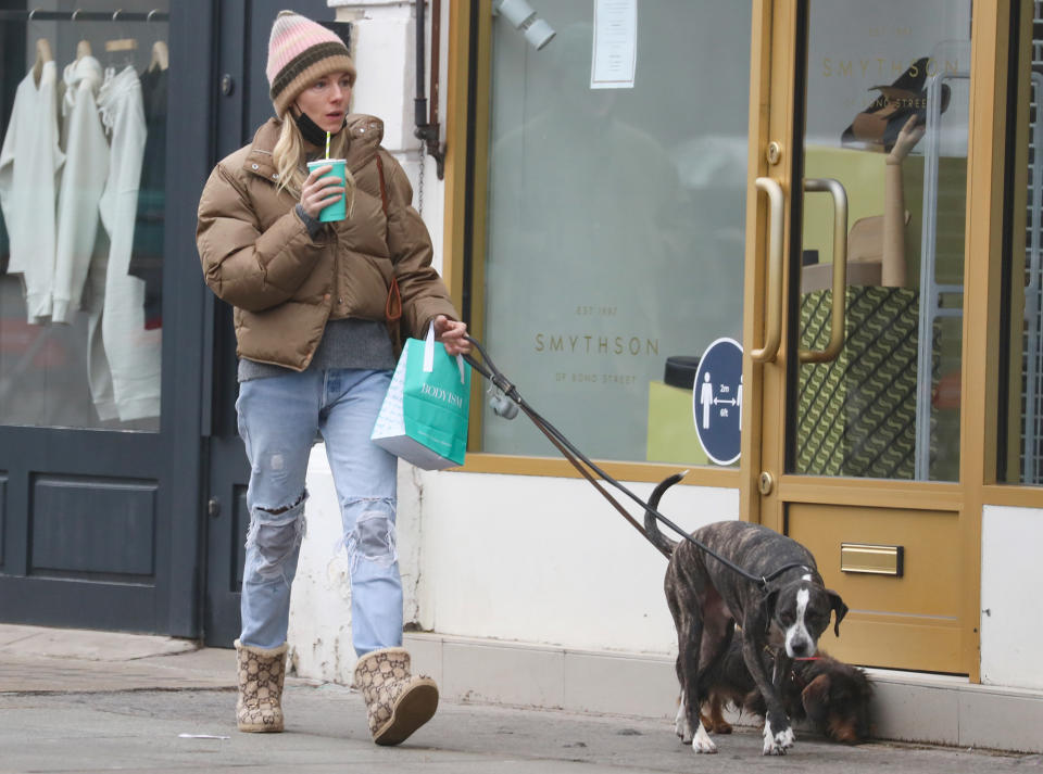 <p>Sienna Miller is seen walking her dogs outside of Daylesford Organic farm shop on Tuesday in London.</p>