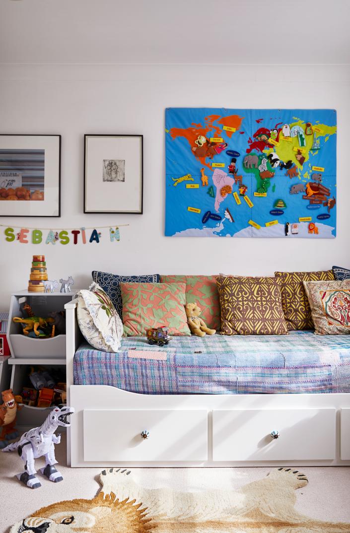 Sebastian&#x002019;s&#xa0;IKEA daybed is dressed with textile treasures.