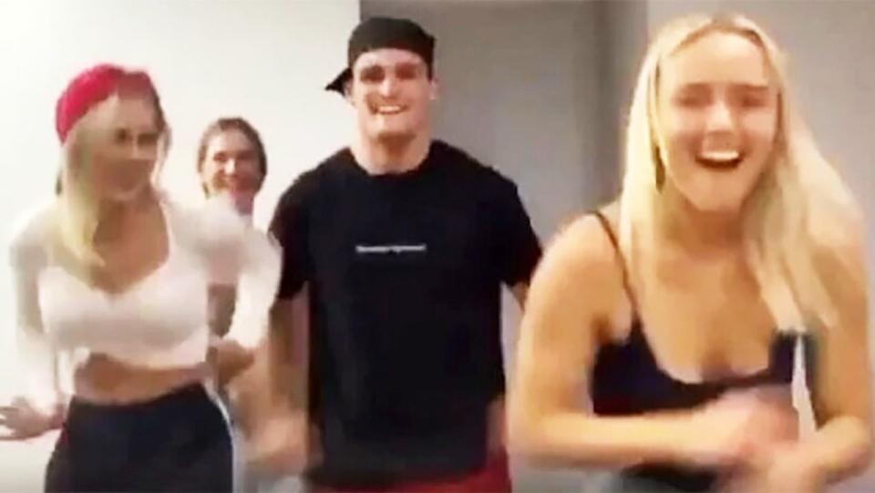 A screenshot shows Penrith player Nathan Cleary dancing with a group of women on TikTok.