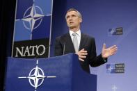 NATO Secretary General Jens Stoltenberg addresses a press conference at the NATO headquarters in Brussels, on October 6, 2015