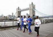 Britain Athletics - London Marathon Previews - London - 20/4/17 Abel Kirui of Kenya (L-R) Feyisa Lilesa of Ethiopia, Ghirmay Ghebreslassie of Eritrea, Bedan Karoki of Kenya and Kenenisa Bekele of Ethiopia ahead of the 2017 Virgin Money London Marathon Action Images via Reuters / Matthew Childs Livepic