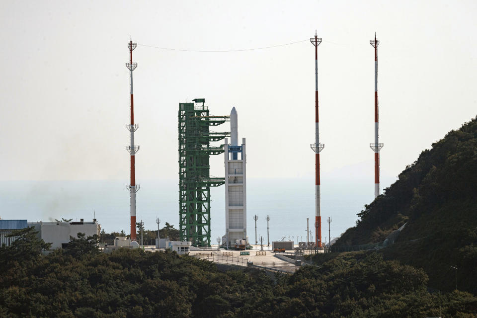 The Nuri rocket, the first domestically produced space rocket, sits on its launch pad at the Naro Space Center in Goheung, South Korea, Thursday, Oct. 21, 2021. South Korea was preparing to test-launch its first domestically produced space rocket Thursday in what officials describe as an important step in its pursuit of a satellite launch program. (Korea Pool via AP)