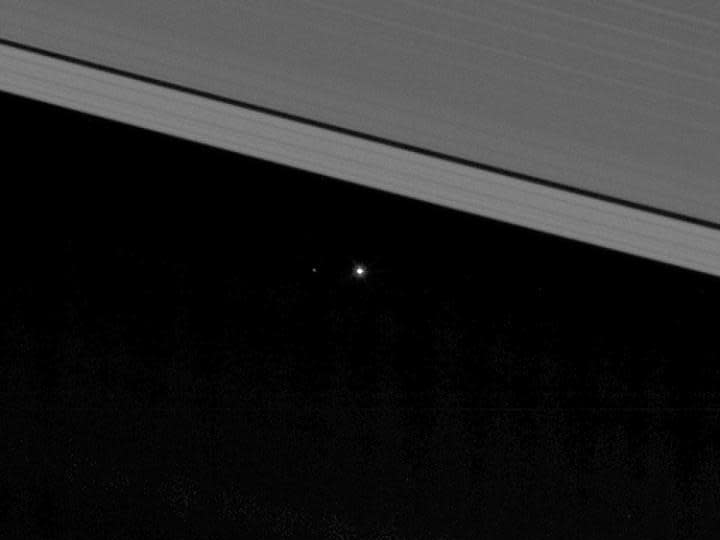 Earth snapped by the Cassini probe from within Saturn's rings (PA)