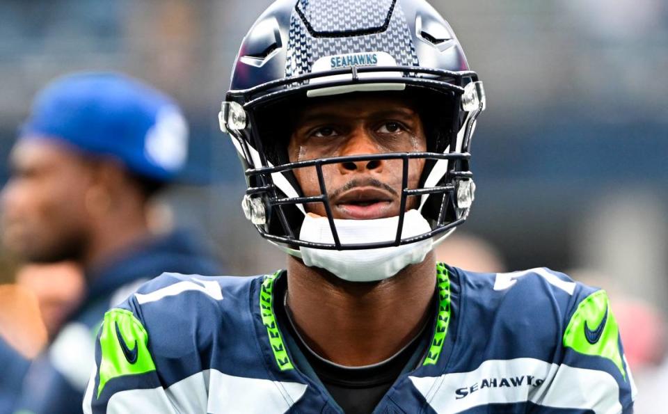 Seattle Seahawks quarterback Geno Smith (7) warms up before the game against the Arizona Cardinals at Lumen Field, Sunday, Oct. 22, 2023, in Seattle, Wash.