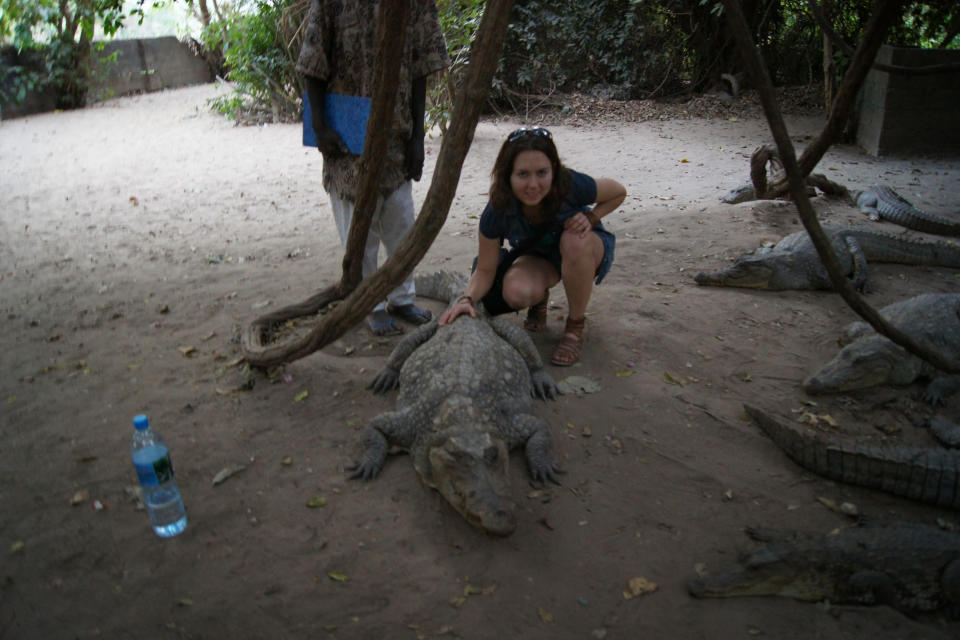 Sandra in Gambia with a crocodile, at New Year 2010 (Collect/PA Real Life)