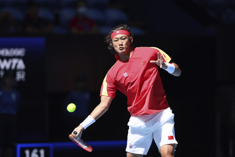 Zhizhen Zhang of China plays a forehand return to Jiri Lehecka of the Czech Republic during the United Cup tennis tournament in Perth, Australia, Saturday, Dec. 30, 2023. (AP Photo/Trevor Collens)