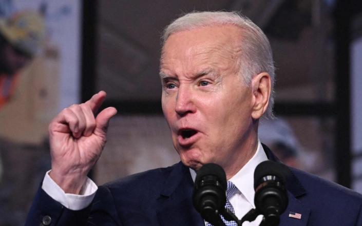 US President Joe Biden speaks about the creation of new manufacturing jobs at the Washington Hilton in Washington - Jim Watson/AFP