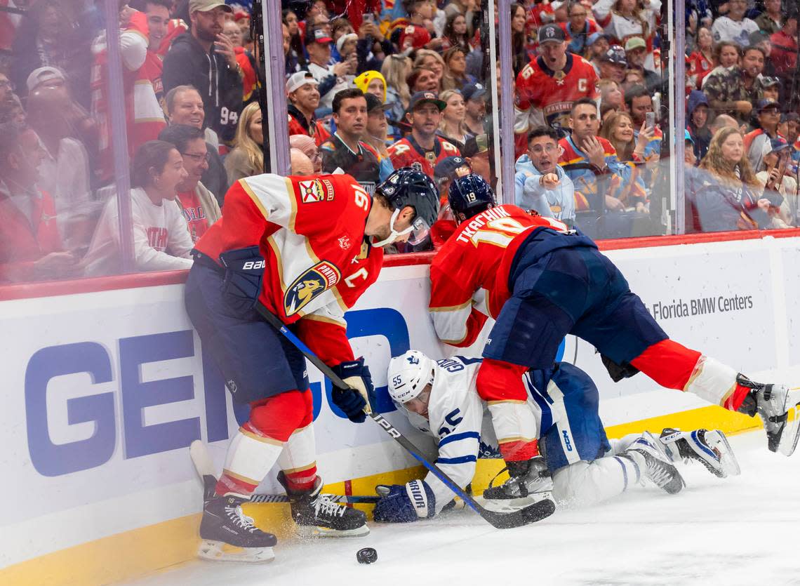 Florida Panthers center Aleksander Barkov (16) and left wing Matthew Tkachuk (19) recover the puck from Toronto Maple Leafs defenseman Mark Giordano (55) in the second period of their NHL game at the Amerant Bank Arena on Thursday, Oct. 19, 2023, in Sunrise, Fla.