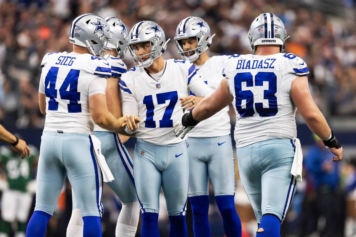 Teammates congratulate kicker Brandon Aubrey (17) after he scored a field goal in the first quarter against the New York Jets on Sunday, September 17, 2023, at AT&T Stadium in Arlington.