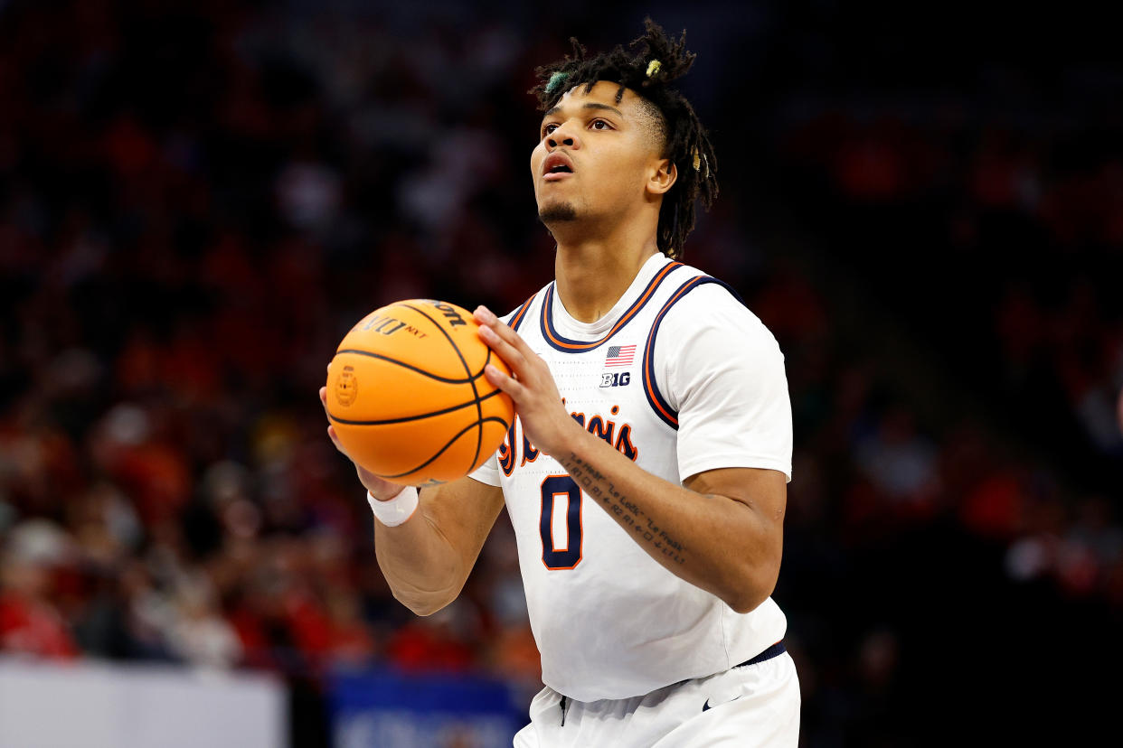 MINNEAPOLIS, MINNESOTA - MARCH 17: Terrence Shannon Jr. #0 of the Illinois Fighting Illini shoots a free throw against the Wisconsin Badgers in the second half at Target Center during the Championship game of the Big Ten Tournament on March 17, 2024 in Minneapolis, Minnesota. The Fighting Illini defeated the Badgers 93-87 to advance to March Madness. (Photo by David Berding/Getty Images)