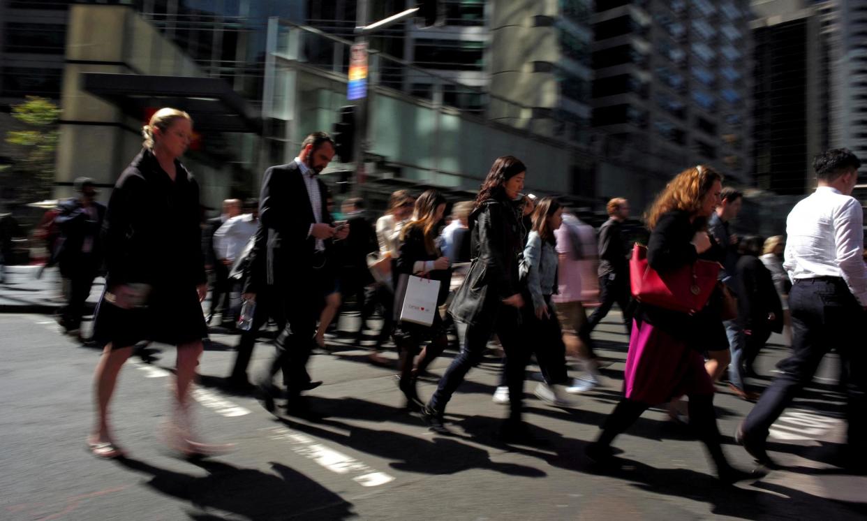 <span>Office workers and shoppers walk through Sydney's central business district. The unemployment rate remained unchanged at 4.2%.</span><span>Photograph: Jason Reed/Reuters</span>