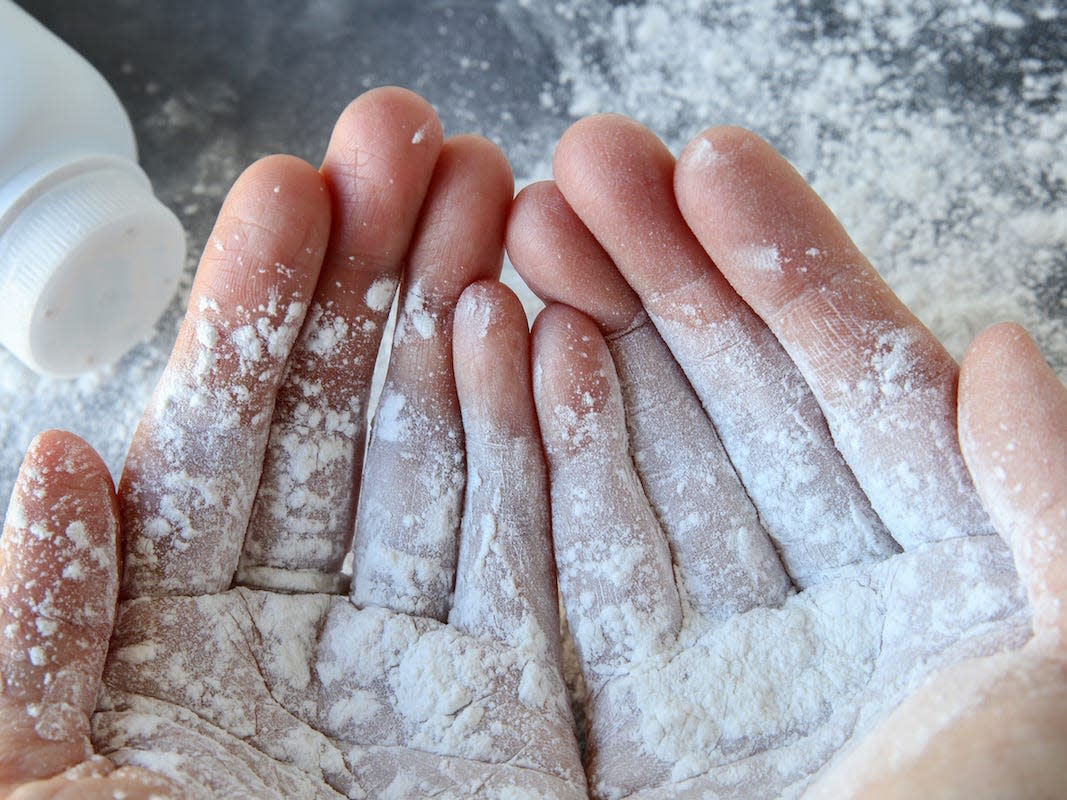 baby powder on hands