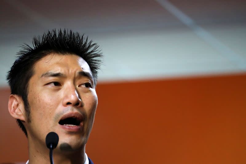 Thailand's opposition Future Forward Party leader Thanathorn Juangroongruangkit reacts after hearing the verdict from the Constitutional Court