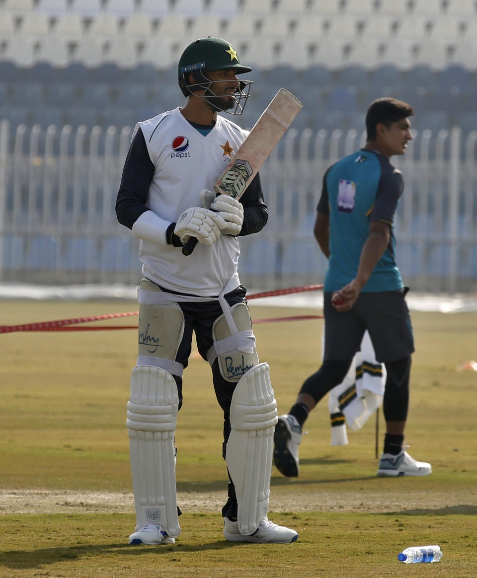 Pakistani batsman Shan Masood, left, attends a practice session for the first test match against Sri Lanka at the Pindi stadium in Rawalpindi, Pakistan, Monday, Dec. 9, 2019. (AP Photo/Anjum Naveed)