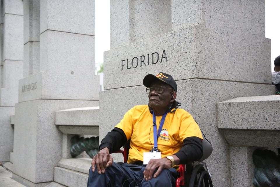 Joseph Williams, a World War II veteran who served in the Army, poses for his picture in front of the Florida pillar at the World War II Memorial, April 27, 2024.