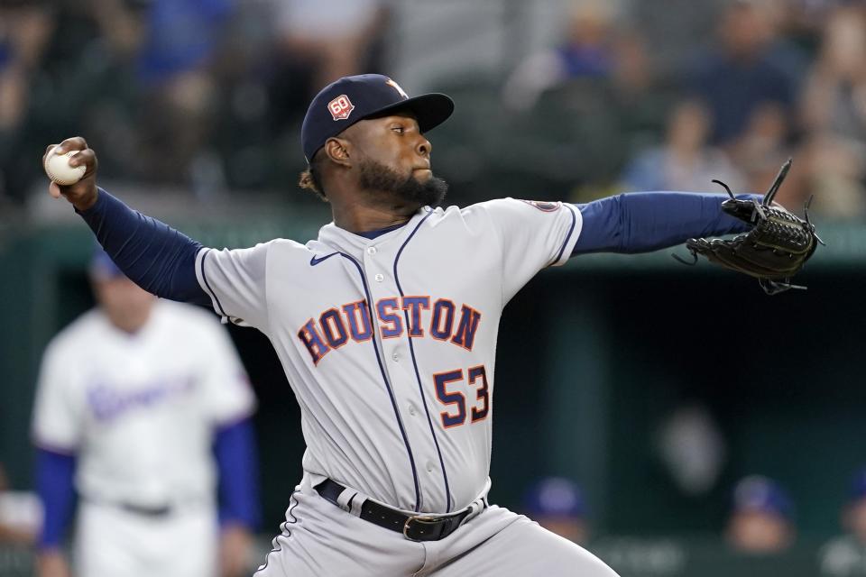 Houston Astros starting pitcher Cristian Javier throws to the Texas Rangers in the first inning of a baseball game, Monday, June 13, 2022, in Arlington, Texas. (AP Photo/Tony Gutierrez)
