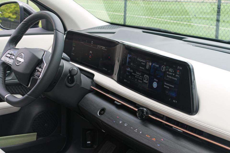 The interior of the 2023 Nissan Ariya, with 2 screens.