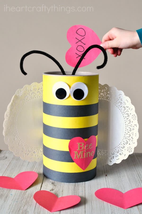 <p>The classroom will be all abuzz about this sweet-as-honey idea, which gets its cylindrical shape from an oatmeal canister.</p><p><strong>Get the tutorial at <a href="https://iheartcraftythings.com/bee-valentine-box.html" rel="nofollow noopener" target="_blank" data-ylk="slk:I Heart Crafty Things" class="link rapid-noclick-resp">I Heart Crafty Things</a>.</strong> </p>