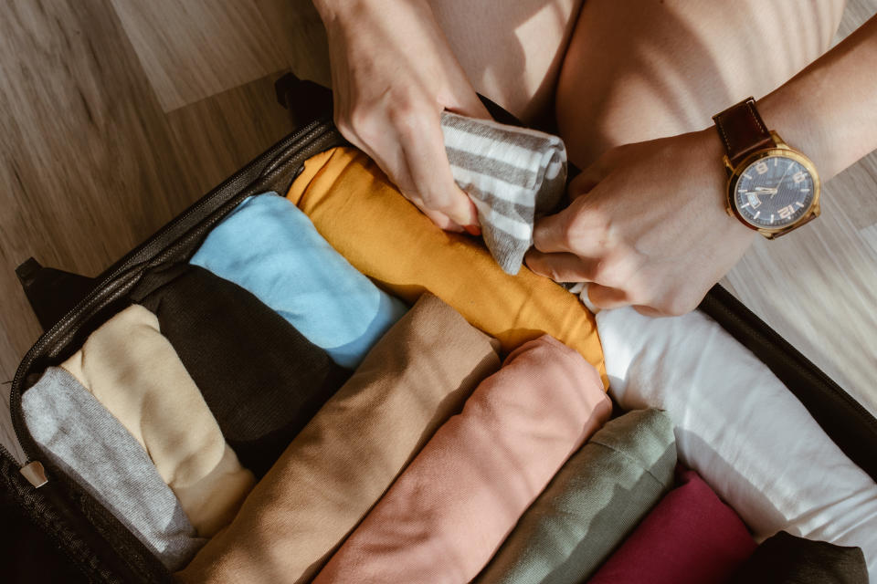 Pack light to avoid checked baggage fees. (Photo: Gettyimages)