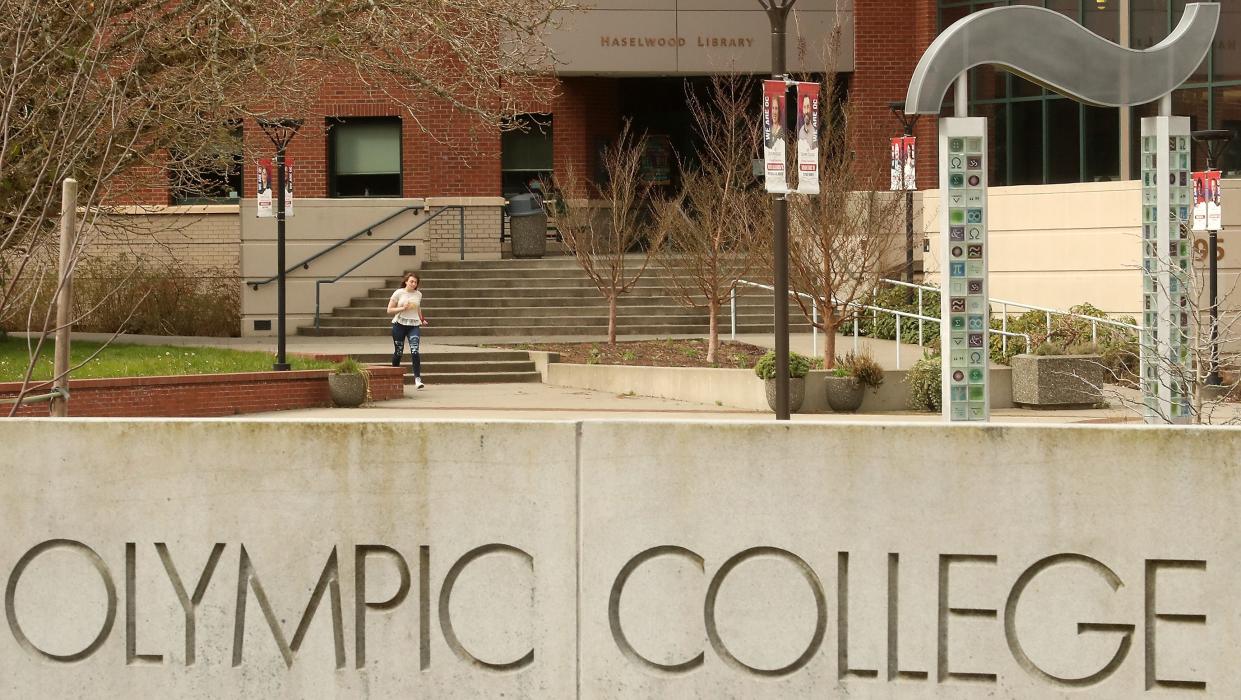 A student hurries through the empty courtyard at Olympic College in Bremerton in March 2020.