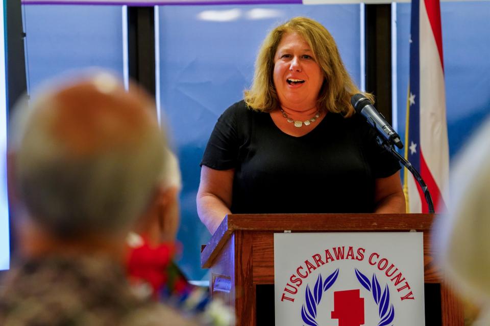 Tammy Spidell, a softball star at Strasburg High, delivers remarks at the Tuscarawas County Sports Hall of Fame Saturday.