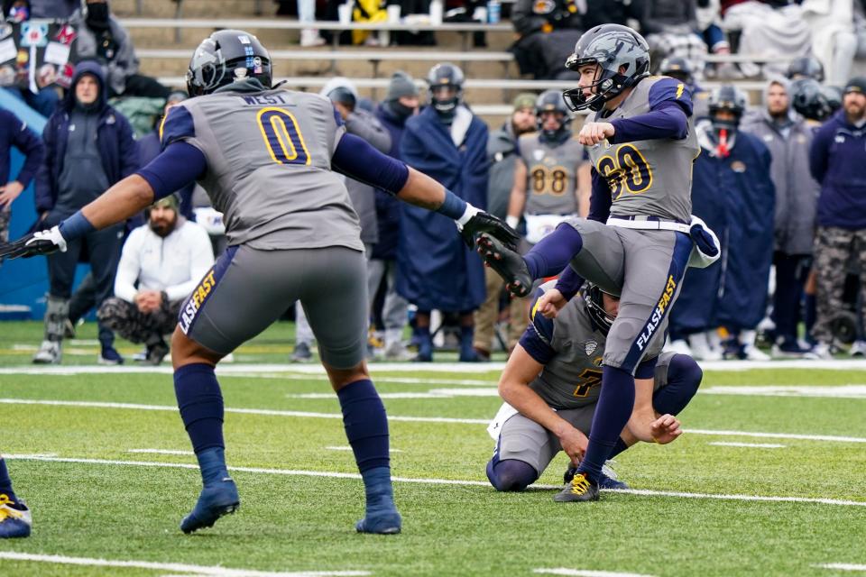 Kent State kicker Andrew Glass boots an extra point during last season's victory over Miami of Ohio at Dix Stadium.