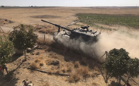 Turkish Armed Forces' howitzers deploy across Syrian town of Tal Abyad - Credit: &nbsp;Anadolu