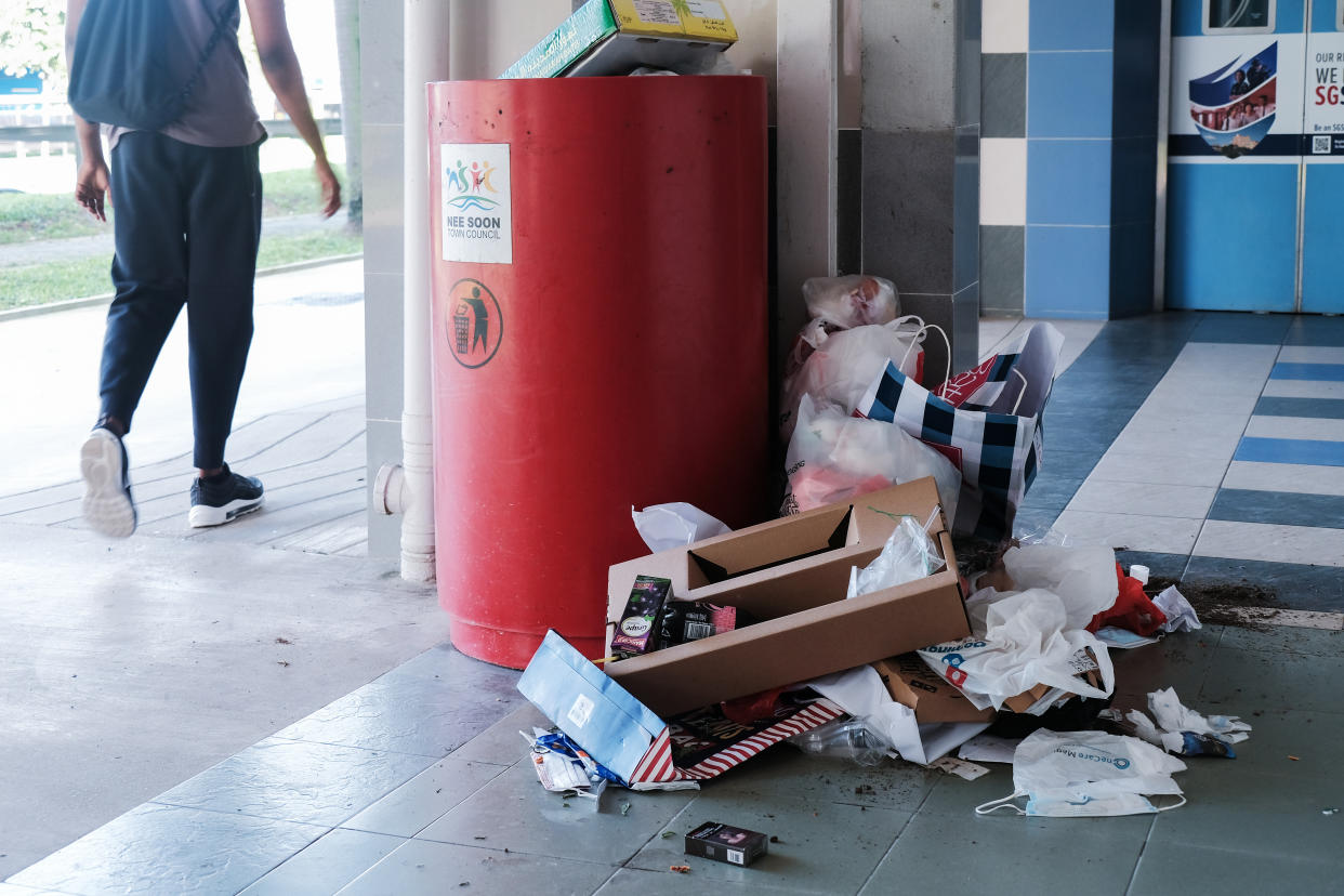 A rubbish pile left at a HDB void deck. 