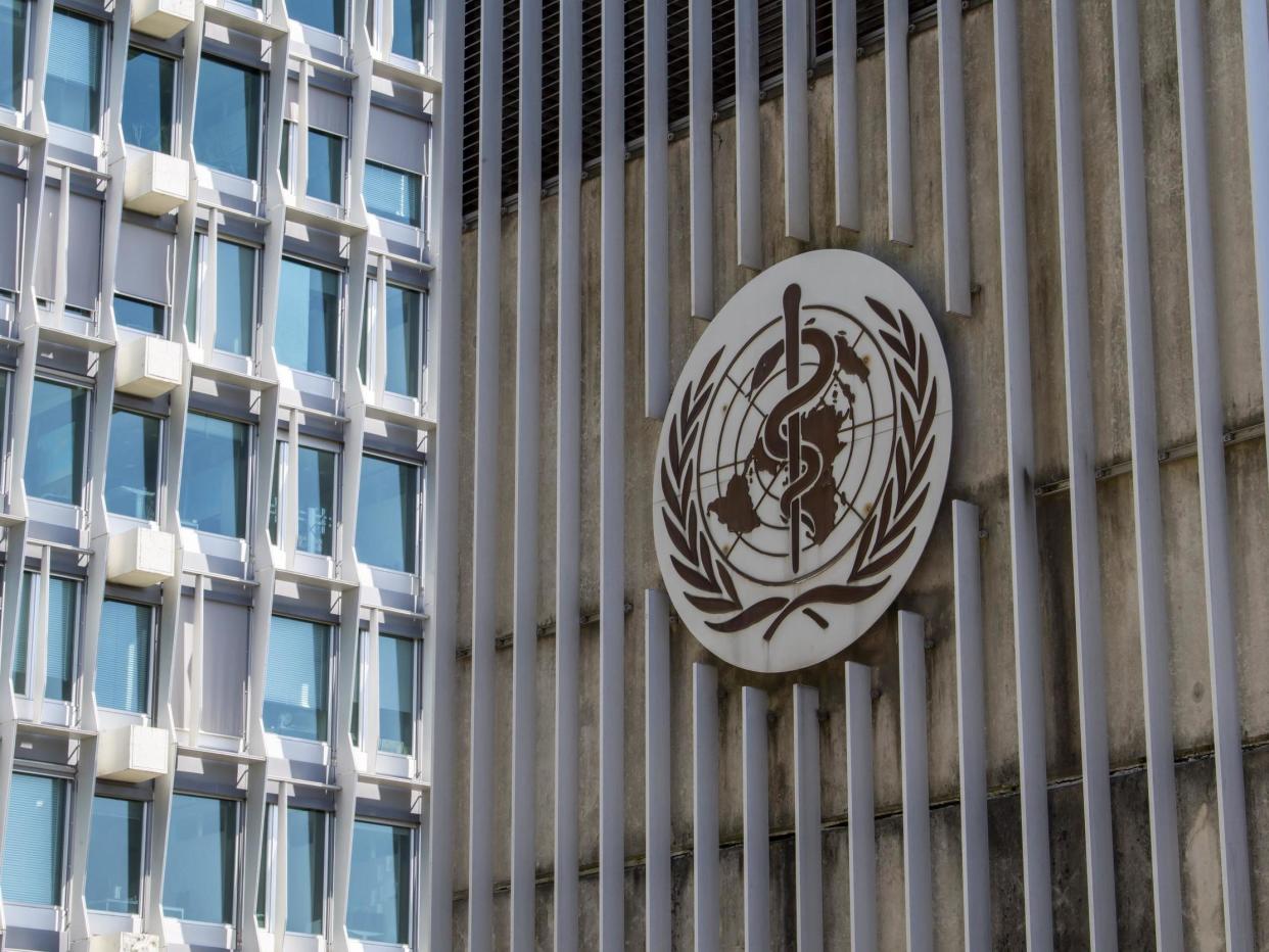 The logo and building of the World Health Organisation headquarters in Geneva, Switzerland: EPA/MARTIAL TREZZINI