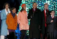 In a much more demure holiday celebration, "How I Met Your Mother" star Neil Patrick Harris and "Modern Family" actor Rico Rodriguez joined President Barack Obama, First Lady Michelle Obama, and the first couple's daughters Malia (third from left) and Sasha (second from left) for the annual lighting of the National Christmas tree on Thursday. (12/6/2012)