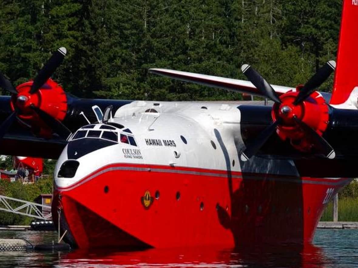 The Martin Mars water bomber, Hawaii Mars II, is shown in its sale listing.  (Coulson Flying Tankers/András Mihalik - image credit)