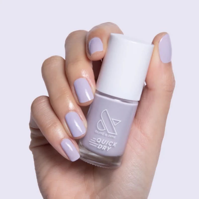 <p>Olive & June Quick Dry Polish in Jacaranda, $8, <a href="https://go.skimresources.com?id=133023X1595699&xs=1&url=https%3A%2F%2Foliveandjune.com%2Fproducts%2Fjacaranda" rel="noopener" target="_blank" data-ylk="slk:available here;elm:context_link;itc:0;sec:content-canvas" class="link ">available here</a></p>