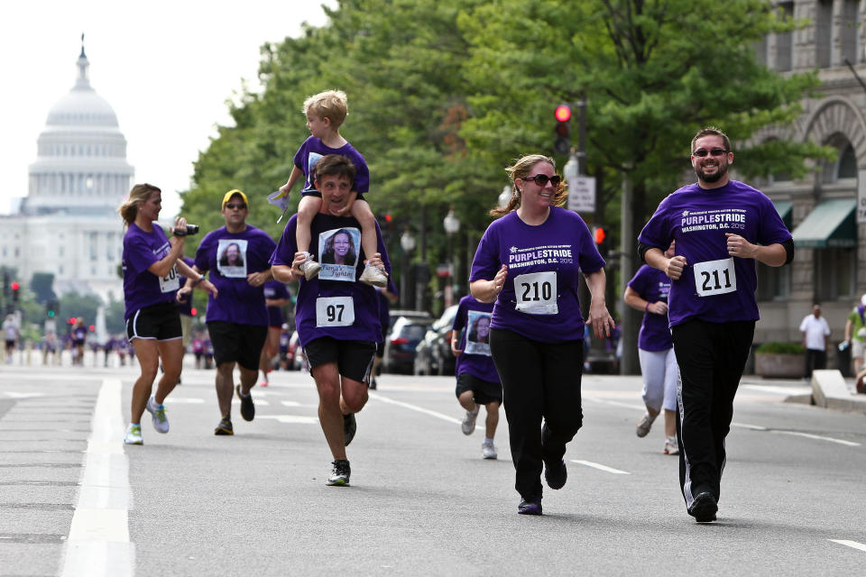 Runners approach the finish line at the Pancreatic Cancer Action Network's PurpleStride 5K Run/Walk on June 16, 2012. (Photo: Paul Morigi via Getty Images)