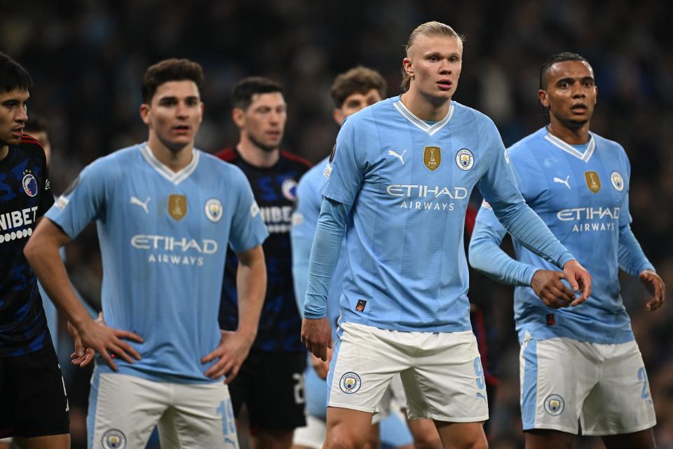 Manchester City strikers #19 Julian Alvarez, #09 Erling Haaland and defender #25 Manuel Akanji defend a corner kick during the UEFA Champions League round of 16 football match against FC Copenhagen. (Photo by Paul ELLIS / AFP) (Photo by PAUL ELLIS/AFP via Getty Images)