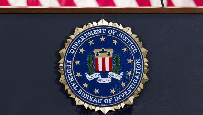 This June 14, 2018, file photo shows an FBI seal on a podium before a news conference at the agency’s headquarters in Washington.