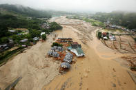 <p>An areal view of flooded Asakura City, Fukuoka prefecture, on July 6, 2017. (Photo: STR/AFP/Getty Images) </p>