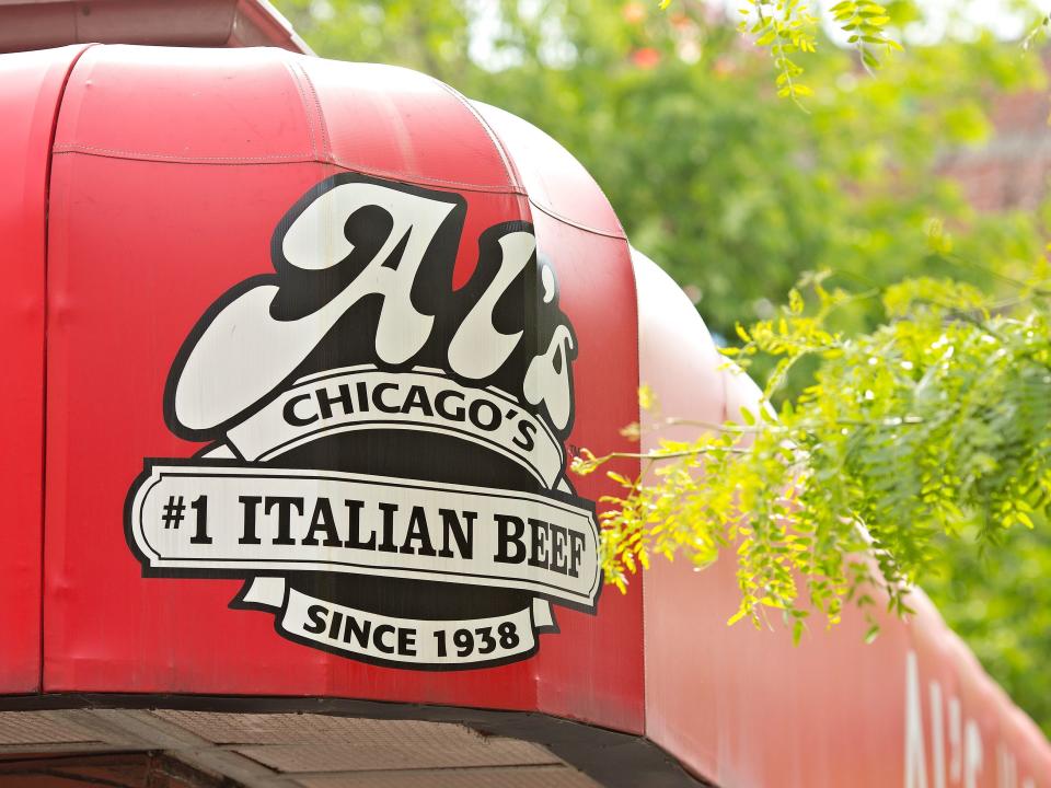 Red Al's beef awning by trees in chicago