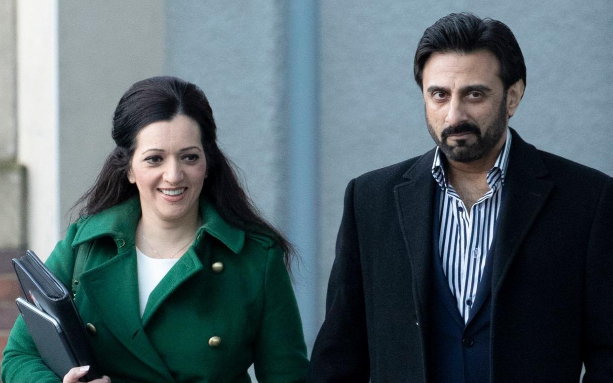 Tasmina Ahmed-Sheikh arriving at the hearing with her husband Zulfikar Sheikh - PA