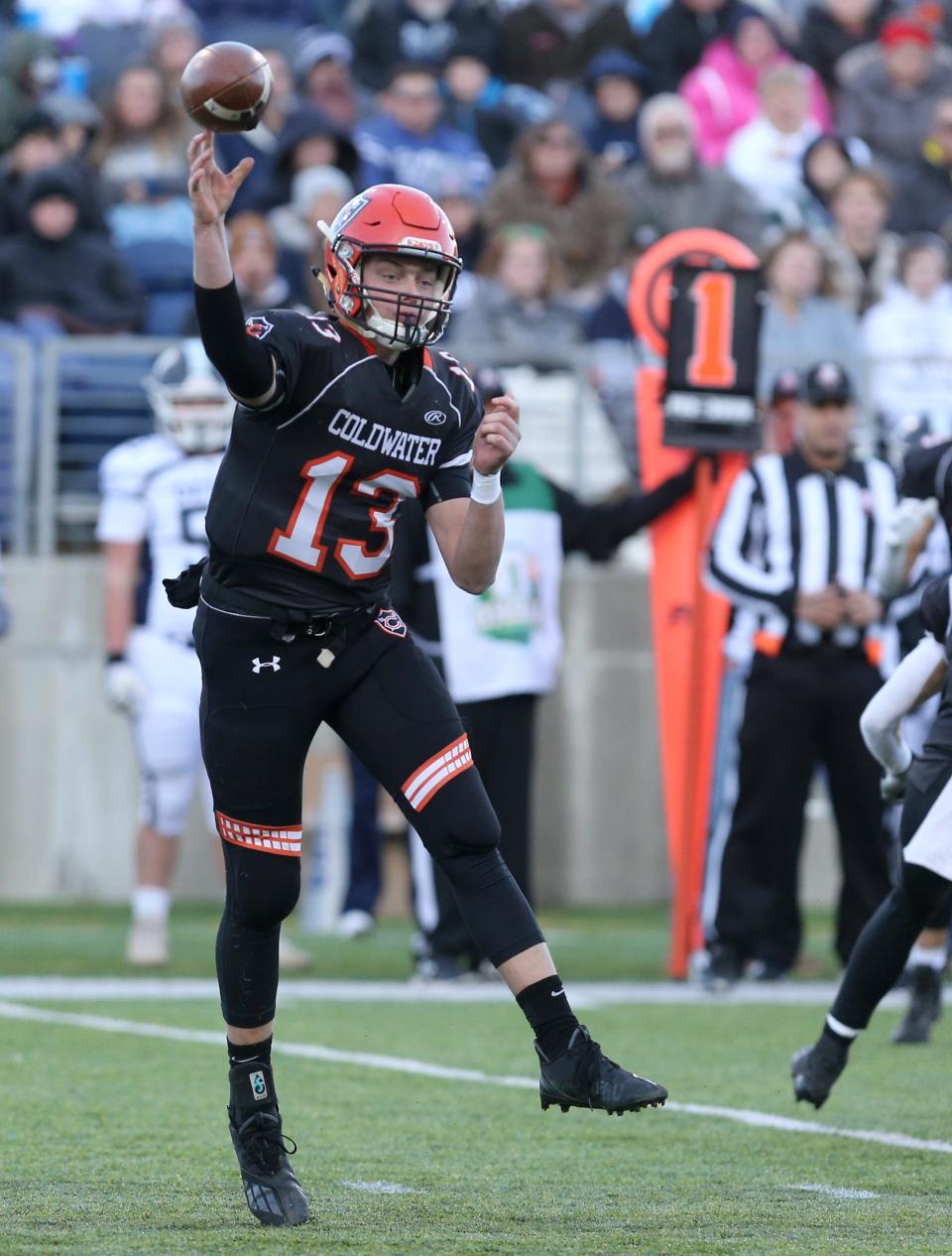 Reece Dellinger of Coldwater targets a receiver during their DVI state championship game against Carey at Tom Benson Hall of Fame Stadium on Saturday, Dec. 4, 2021.