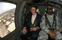 US Secretary of Defense Leon Panetta (L) and Commanding General of US Forces in Iraq, Lt. Gen. Lloyd Austin fly in a Blackhawk helicopter over Baghdad. American forces are pursuing Iran-backed insurgents in Iraq, Panetta said in Baghdad on Monday as US deaths spike nearly a year after US troops formally ended combat operations