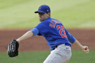 Chicago Cubs starting pitcher Kyle Hendricks delivers in the first inning in a baseball game against the Cleveland Indians, Wednesday, Aug. 12, 2020, in Cleveland. (AP Photo/Tony Dejak)