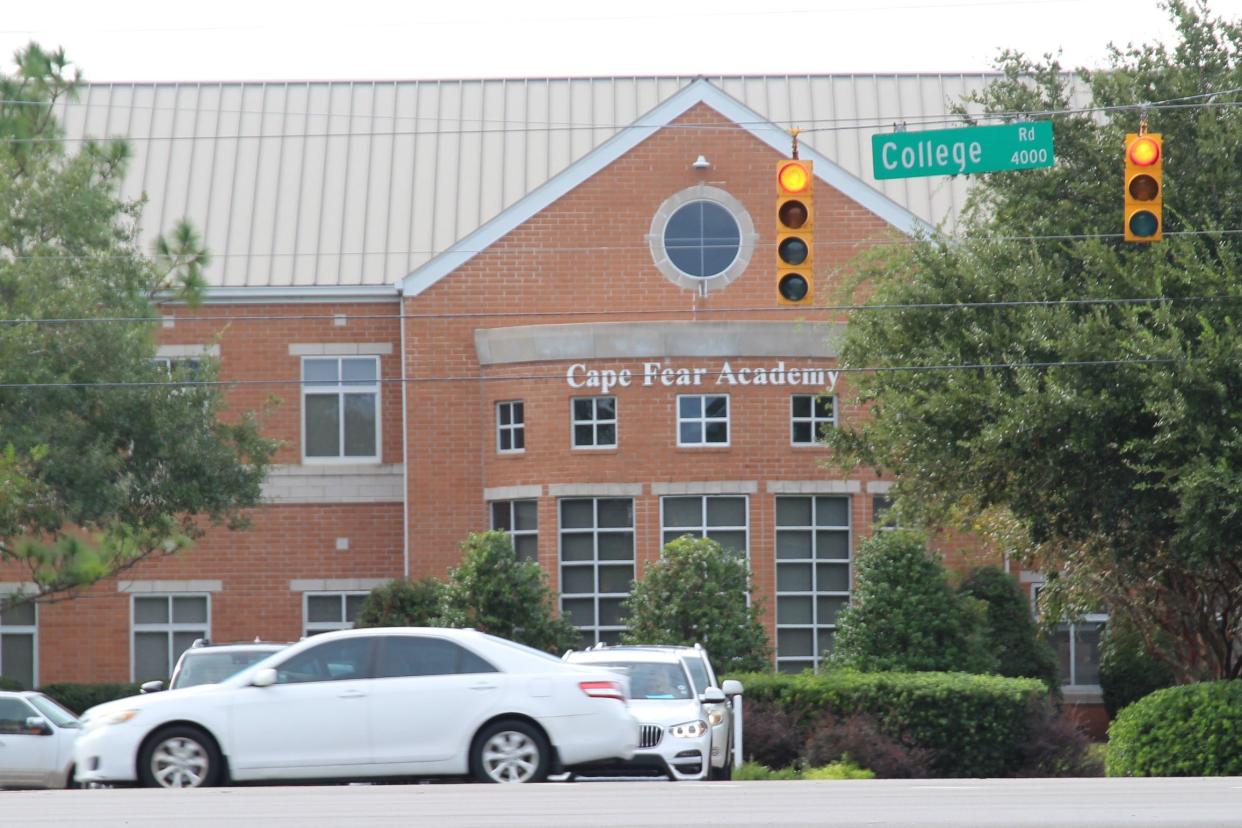 Three former Cape Fear Academy students have filed a lawsuit against the school.