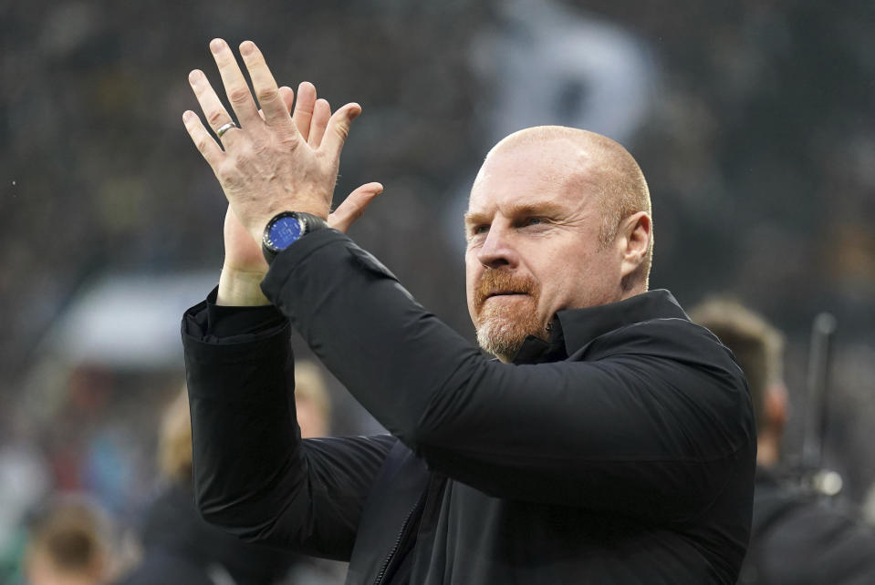 Everton's head coach Sean Dyche applauds the fans ahead of the English Premier League soccer match between Newcastle United and Everton at St. James' Park, in Newcastle, England, Tuesday, April 2, 2024. (Owen Humphreys/PA via AP)