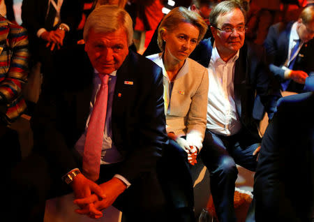 Premier Volker Bouffier of the German state of Hesse and German defence Minister Ursula von der Leyen watch a TV debate between German Chancellor Angela Merkel of the Christian Democratic Union (CDU) and her challenger Germany's Social Democratic Party SPD candidate for chancellor Martin Schulz in Berlin, Germany, September 3, 2017. REUTERS/Fabrizio Bensch