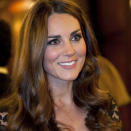 <b>Kate Middleton Top 10 Best Hairstyles:</b> At a fundraiser for the University of St Andrews, Kate opted for glamorous, loose waves as she recycled a lace dress ©Rex