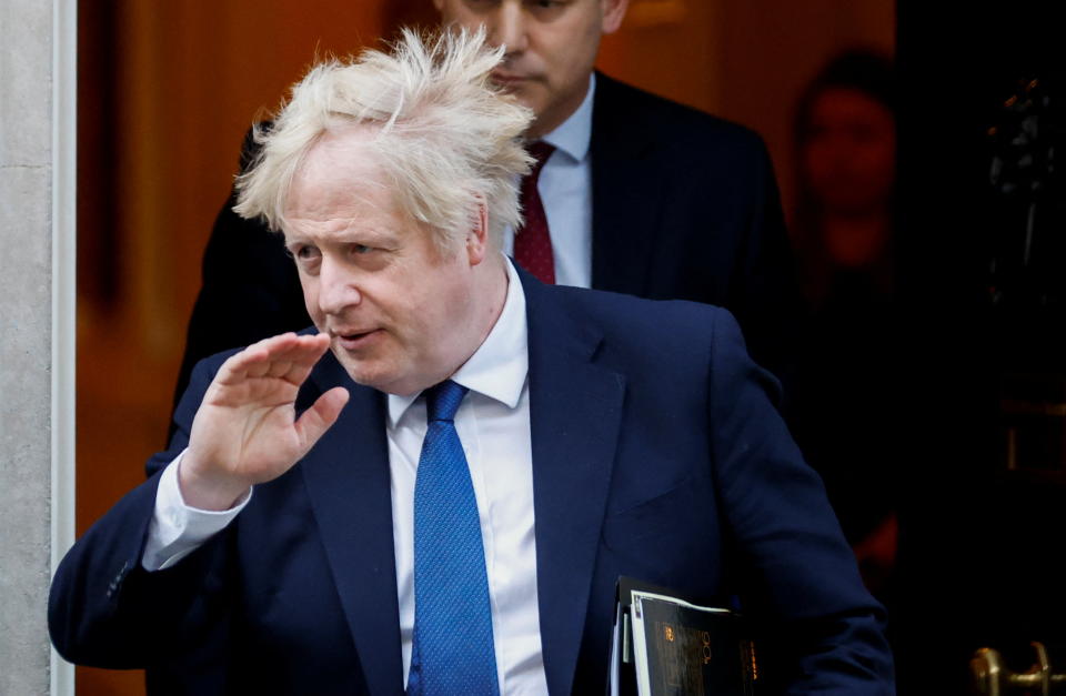 British Prime Minister Boris Johnson leaves Downing Street, in London, Britain, February 24, 2022. REUTERS/Peter Cziborra