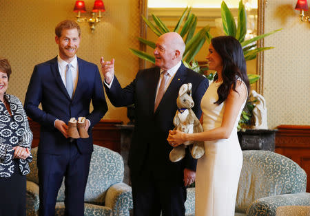 Britain's Prince Harry and wife Meghan, Duchess of Sussex are welcomed by Australia's Governor General Peter Cosgrove and his wife Lynne Cosgrove at Admiralty House during their visit in Sydney, Australia October 16, 2018. REUTERS/Phil Noble/Pool