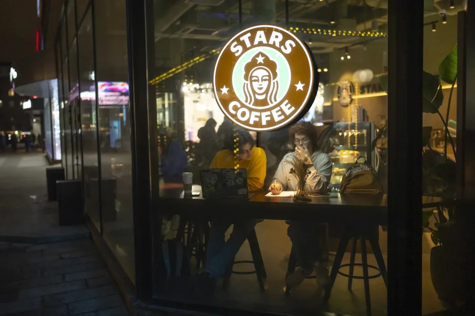 FILE - A logo of a newly opened Stars Coffee in the former location of a Starbucks in Moscow, Russia, on Jan. 24, 2023. Crowds might have thinned at some Moscow malls, but not drastically. Some foreign companies like McDonald's and Starbucks have been taken over by local owners who slapped different names on essentially the same menu. (AP Photo/Alexander Zemlianichenko, File)